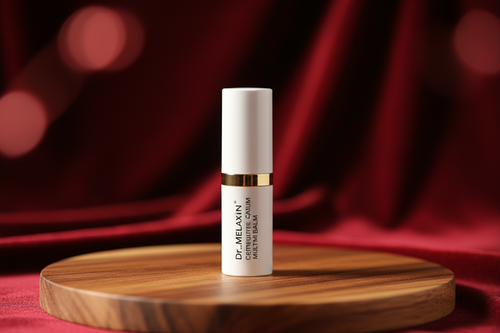 create an image of Dr.Melaxin Cemenrete Calcium Multi Balm on a nice wooden circular platform with the background being a deep velvet red that's blurry